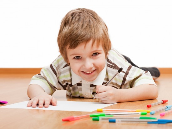 Child drawing or writing